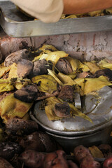 photography of traditional Peruvian food called Pachamanca. Food concept.