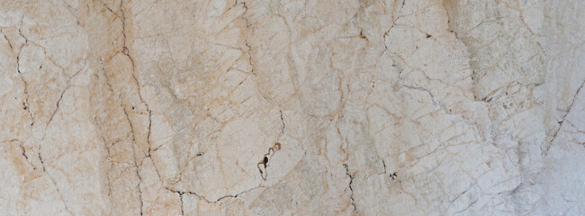 Panoramic marble texture with varied tones and polished finish