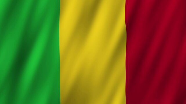 Flag of Mali waving in the breeze during a sunny day