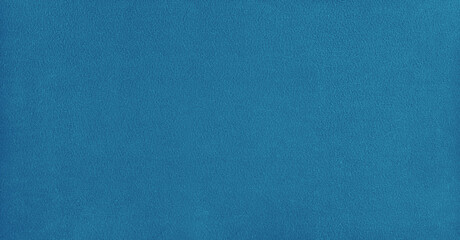 Smooth billiard cloth texture in blue close-up surface view