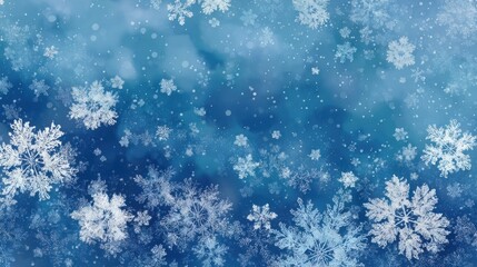 Obraz premium A blue background with snowflakes falling on it. The snowflakes are scattered all over the background, creating a sense of movement and liveliness