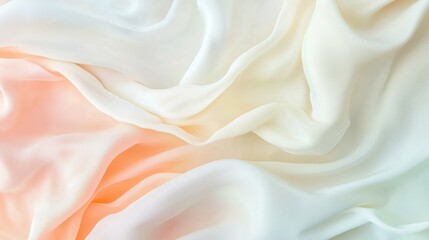 Obraz premium Soft and flowing silk fabric with a gradient of colors showing delicate textures in warm light