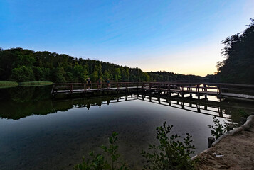 great views of a jetty on a lake in the outskirts of Berlin at sunset