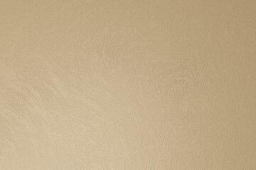 Camel brown concrete rough texture. Light is coming from bottom left