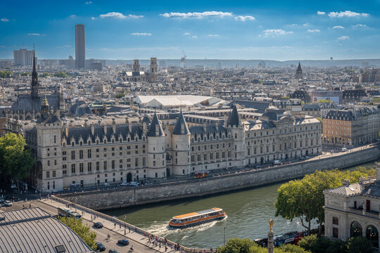 Paris, France - 06 28 2025: Panoramic view of Ile de la Cité, The Seine river, La Conciergerie and West Paris neighborhood from rooftop of Saint-Jacques Tower - Powered by Adobe