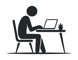 Person working on a laptop at a desk with a plant