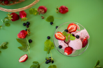 Berry dessert with mint and green composition