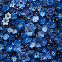 Blue flowers background showcasing a creative mix of different blossoms and floral elements for decorative paper art projects.