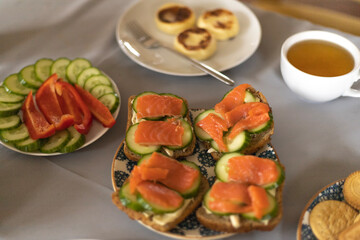 breakfast sandwiches with salted fish and cucumber and cheesecakes