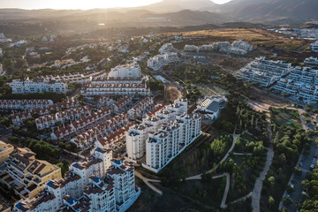 Aerial view of a large urban park in Estepona, surrounded by residential buildings and overlooking...