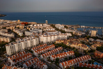 Aerial view of a large urban park in Estepona, surrounded by residential buildings and overlooking...