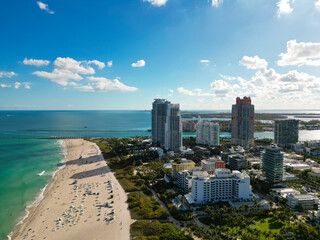 Naklejka premium Miami Beach aerial drone view with skyline. Miami from above. Drone view of Miamis famous landmarks. South Pointe beach with skyscrapers. Miami city panorama. Skyline of Miami Beach.