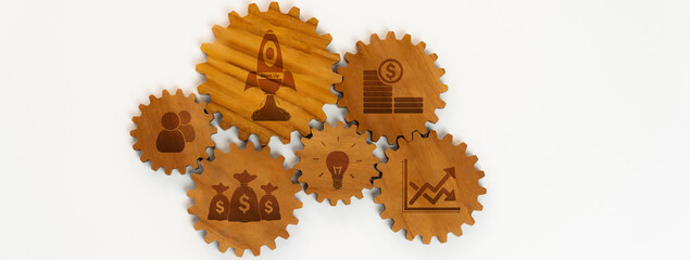 Panorama banner of wooden cogwheel gear connecting each other symbolize function productive system...