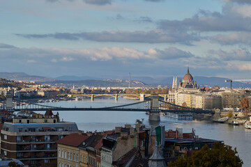 View from Budapest over the Danube river with impressive buildings and bridges