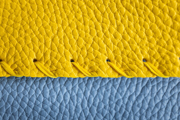 close up of yellow and blue leather