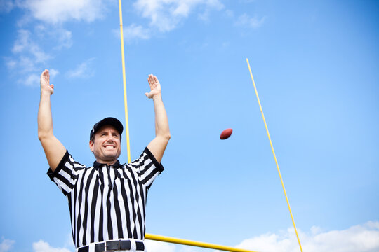 Referee: Signaling a Touchdown