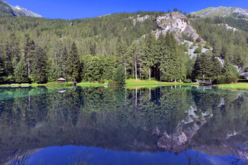 mountain lake reflection in gressoney italy