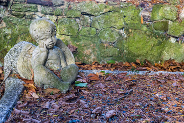 United Kingdom, Isle of Wight - 06.21.2025: Old gravestones in medieval overgrown and forgotten...