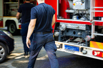 Firefighters respond to emergency incident near city park during daytime hours