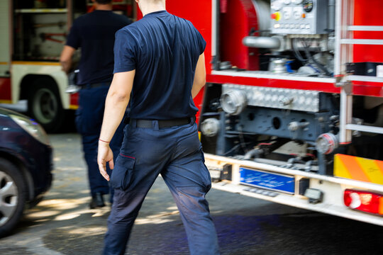 Firefighters respond to emergency incident near city park during daytime hours