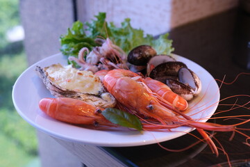 Sushi with salmon, cheese, herbs and smoke. Various japanese food top view
