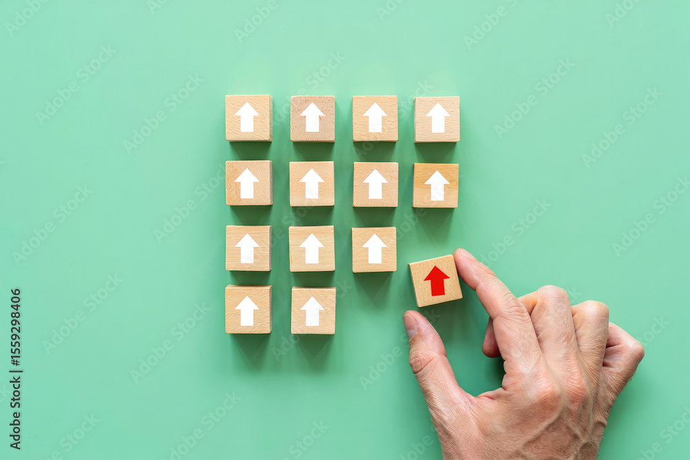 Poster selecting a red arrow block from a group of white arrow blocks representing differentiation, standin