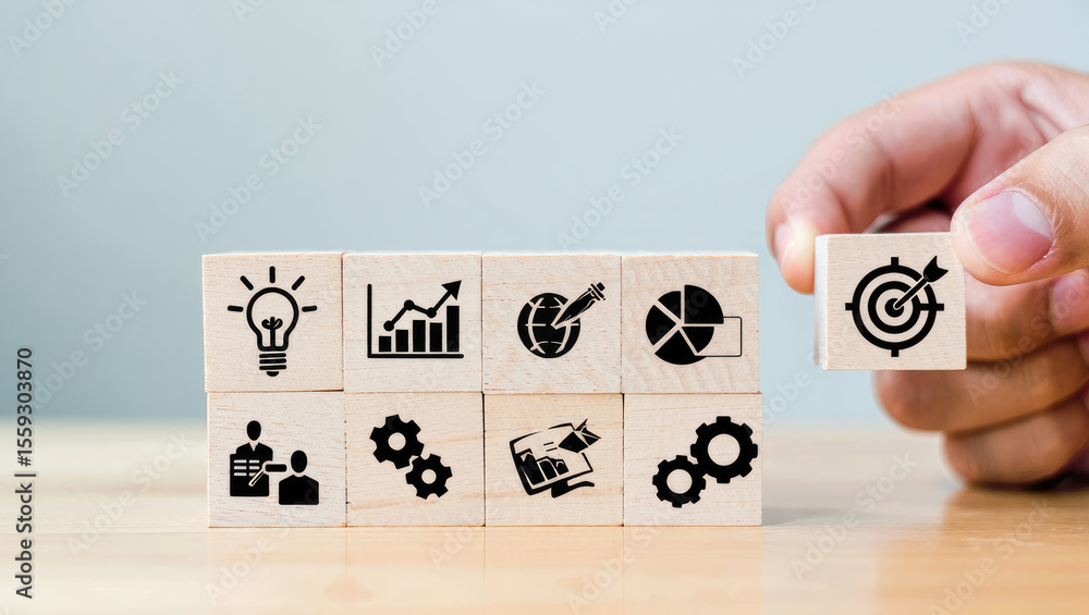 Poster strategic business planning a conceptual arrangement of wooden blocks displaying key business icons 