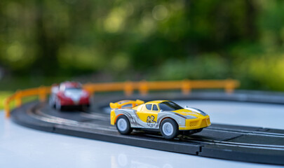 Car racing.Toy cars on the race track.Artificial intelligence controls the car.