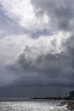 Storm clouds rolling in over the ocean in Galway Ireland