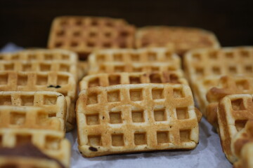 Freshly baked belgium waffles isolated on white background . High quality photo