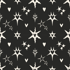 Seamless pattern with edgy stars and hearts. Bold modern design for grunge, punk or alternative fashion. Abstract monochrome vector illustration on black background, hand drawn