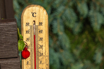 Wooden mercury thermometer, measuring temperature in the orchard,