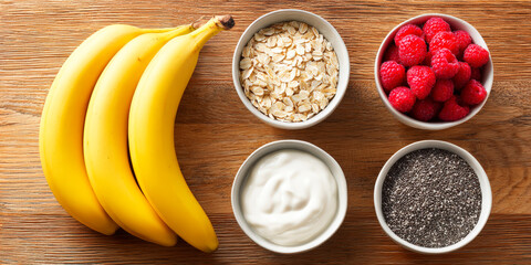 Healthy Breakfast Ingredients with Bananas, Oats, Raspberries, Yogurt