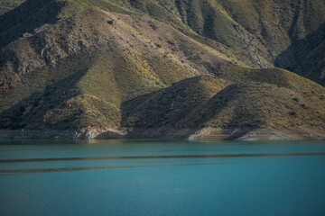 Landscape with small lake and mountains.