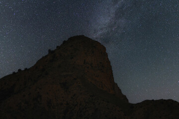 Beautiful night landscape , bright milky way galaxy over the mountain.