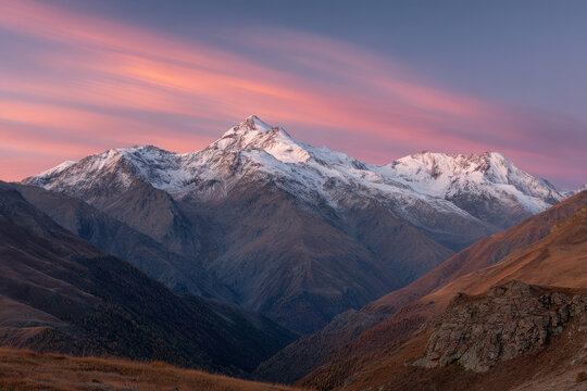 majestic mount elbrus under stunning sunset sky filled with ultrabright clouds