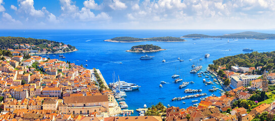 Coastal summer landscape, panorama - top view of the town of Hvar and the City Harbour with marina,...