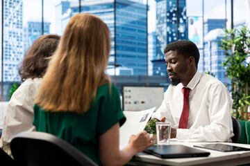 HR professionals negotiating job offers and salary packages with candidate after successful...