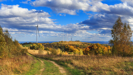 Autumn nature landscape with wind turbines on the ridge of the Carpathian Mountains, western Ukraine