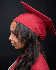 Young African-American Teen Woman Graduation Cap and Gown