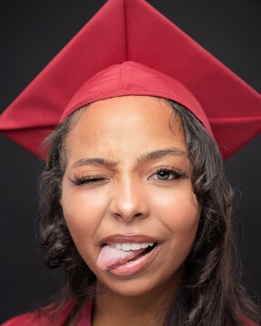 Young African-American Teen Woman Graduation Cap and Gown