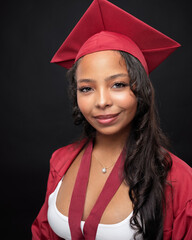 Young African-American Teen Woman Graduation Cap and Gown