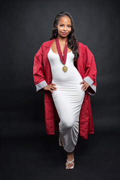 Young African-American Teen Woman Graduation Cap and Gown