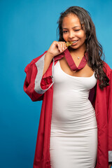 Young African-American Teen Woman Graduation Cap and Gown