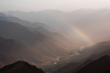 glacial valley in tajikistan at sunrise seen from above