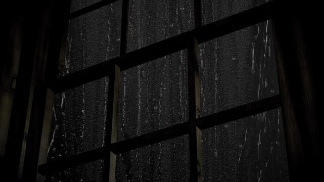 Rainstorm on window at night