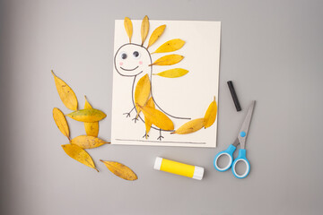 Flat lay of kids DIY animal leaf project. Perfect for children content creators, educational publishers, eco campaigns, toy brands, kindergartens