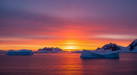 Stunning Arctic Sunset with Icebergs and Mountains