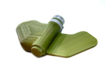 Mina Petal printed on 3D printer isolated on white background. Anti-personnel explosive mine created on 3D printer from molten plastic. Prototype of ammunition printed on 3D printer. Innovation modern