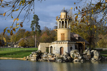 Picturesque "Lighthouse" at the Hameau de la Reine, Versailles, France. An enchanting retreat reflecting Queen Marie Antoinette's idealized rural life. © dsbedarieva